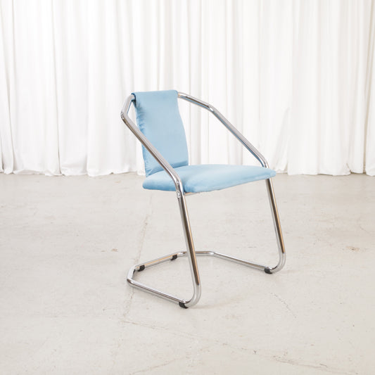 Italian-style chrome dining chair with blue upholstery — condition and details