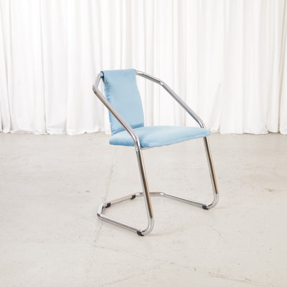 Italian-style chrome dining chair with blue upholstery — condition and details