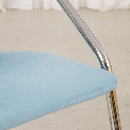 Italian-style chrome dining chair with blue upholstery — condition and details