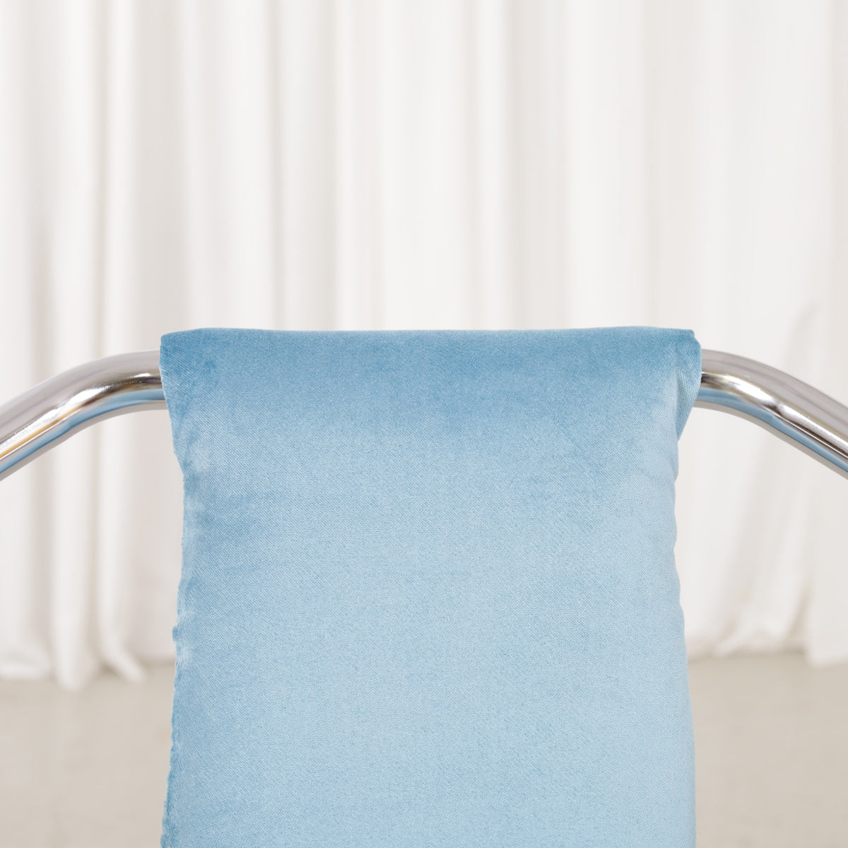 Italian-style chrome dining chair with blue upholstery — condition and details