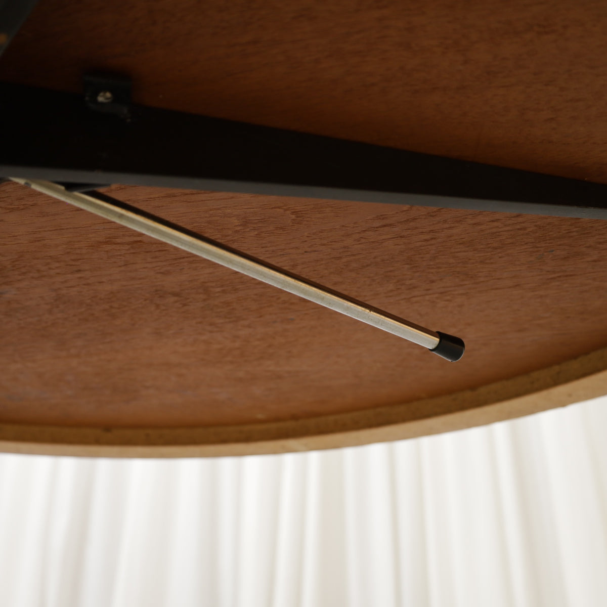 Vintage height-adjustable table with teak top and chrome base — surface, base or mechanism detail