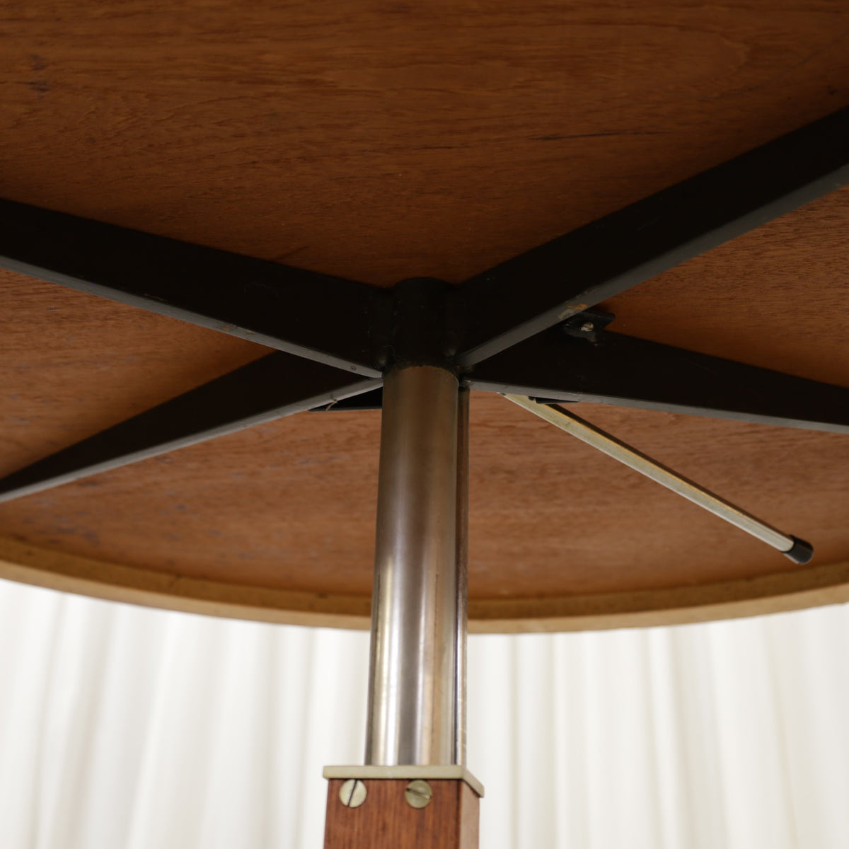 Vintage height-adjustable table with teak top and chrome base — surface, base or mechanism detail