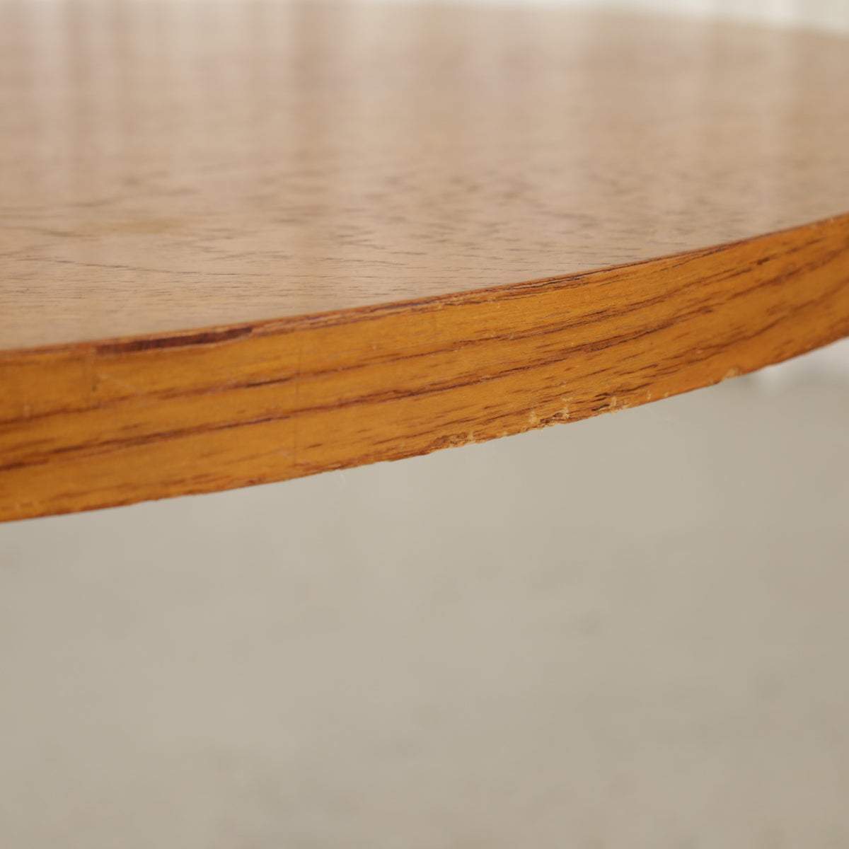Vintage height-adjustable table with teak top and chrome base — surface, base or mechanism detail