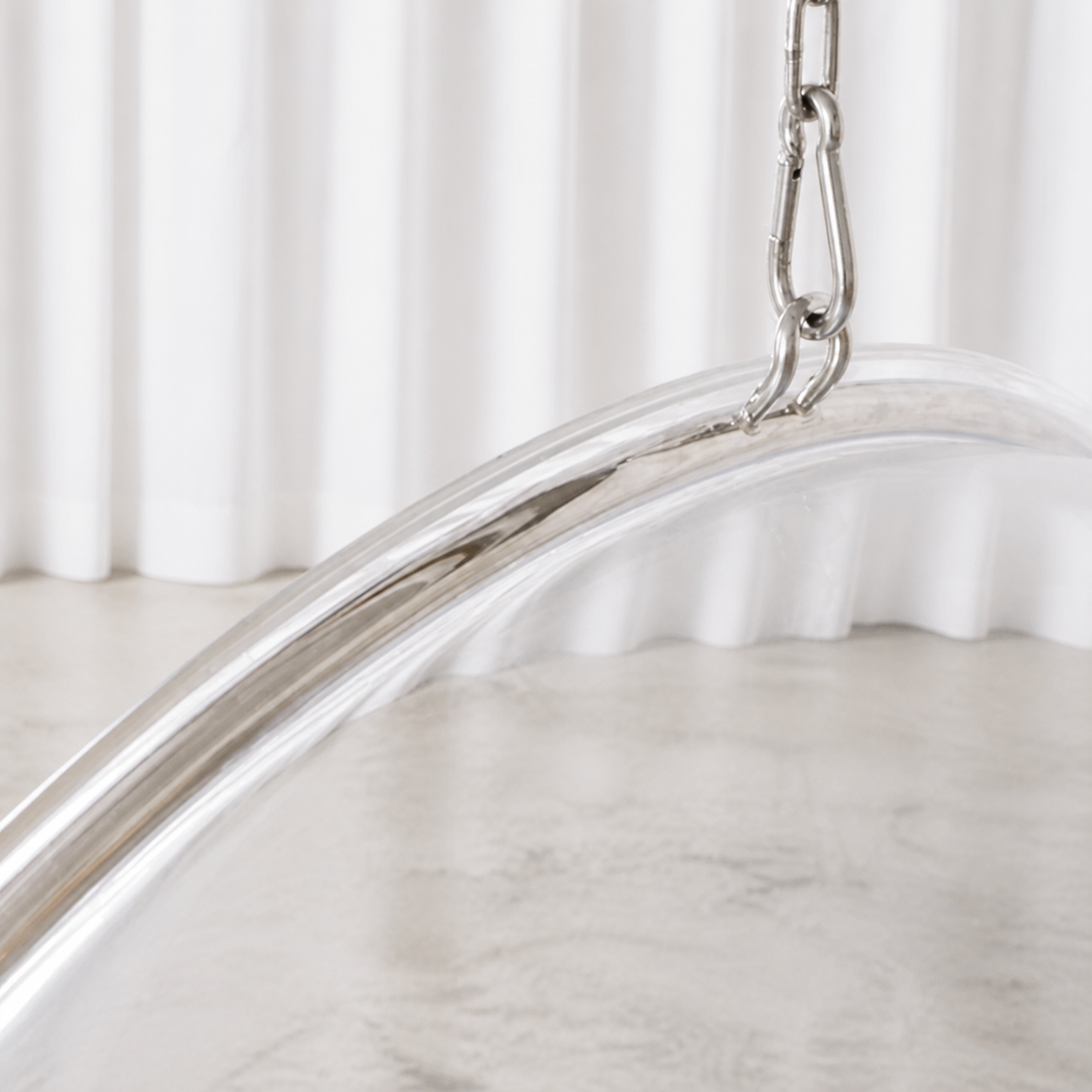 Upper steel ring and suspension attachment detail of Eero Aarnio Bubble Chair