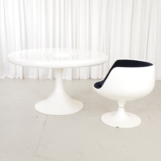 White Eero Aarnio Kanttarelli dining table for Asko, styled with a chair that is not included