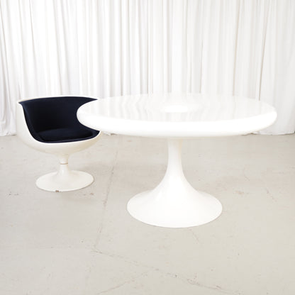 White Eero Aarnio Kanttarelli dining table for Asko, styled with a chair that is not included