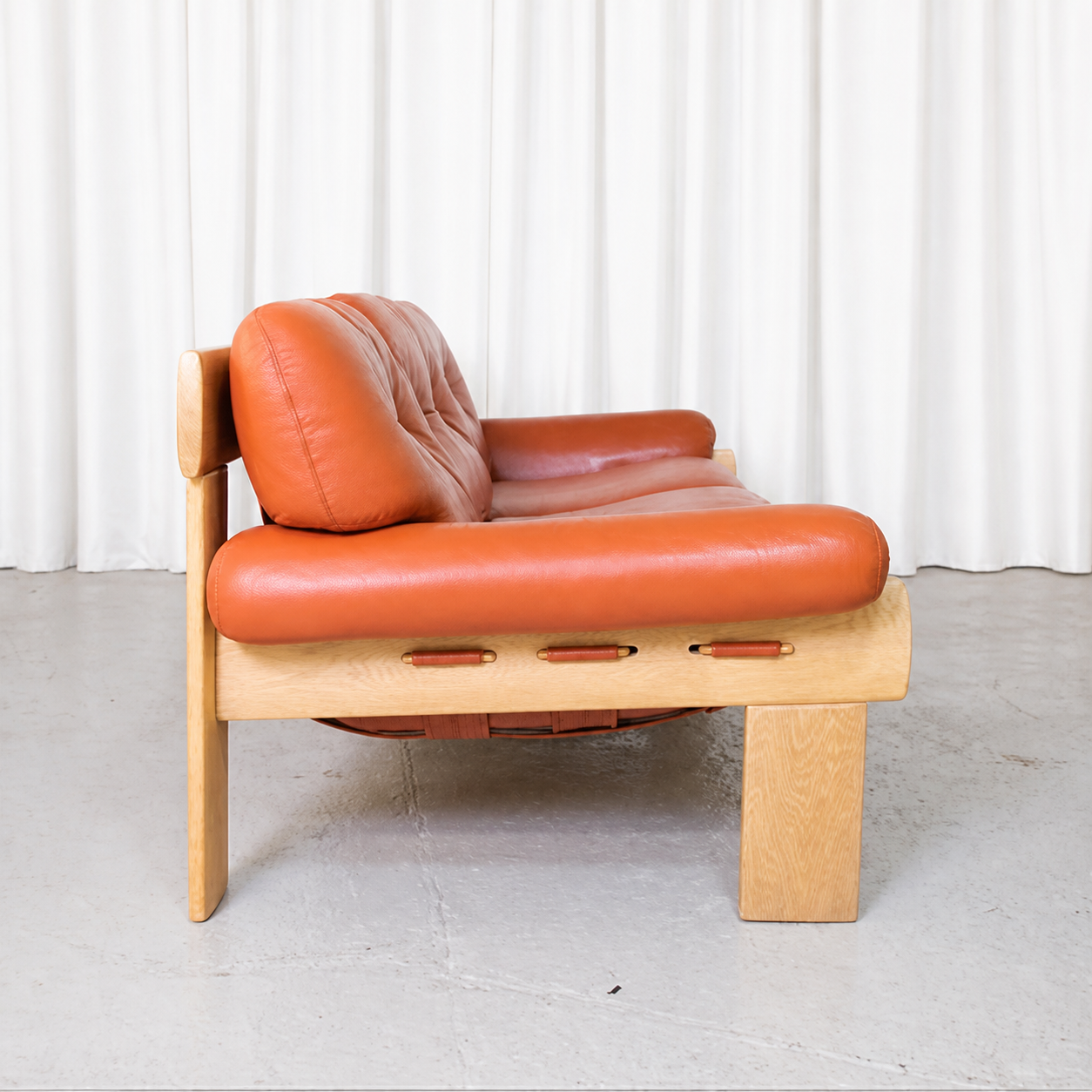 Esko Pajamies Africa sofa in cognac leather, side view