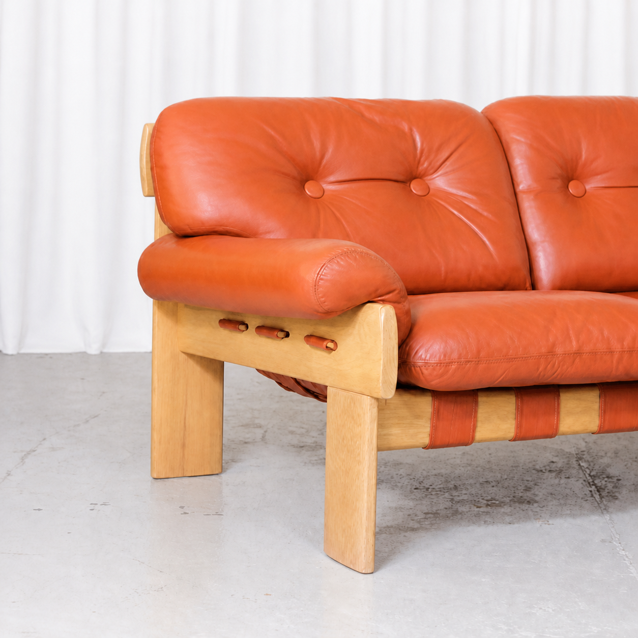 Africa sofa cognac leather cushion and armrest detail