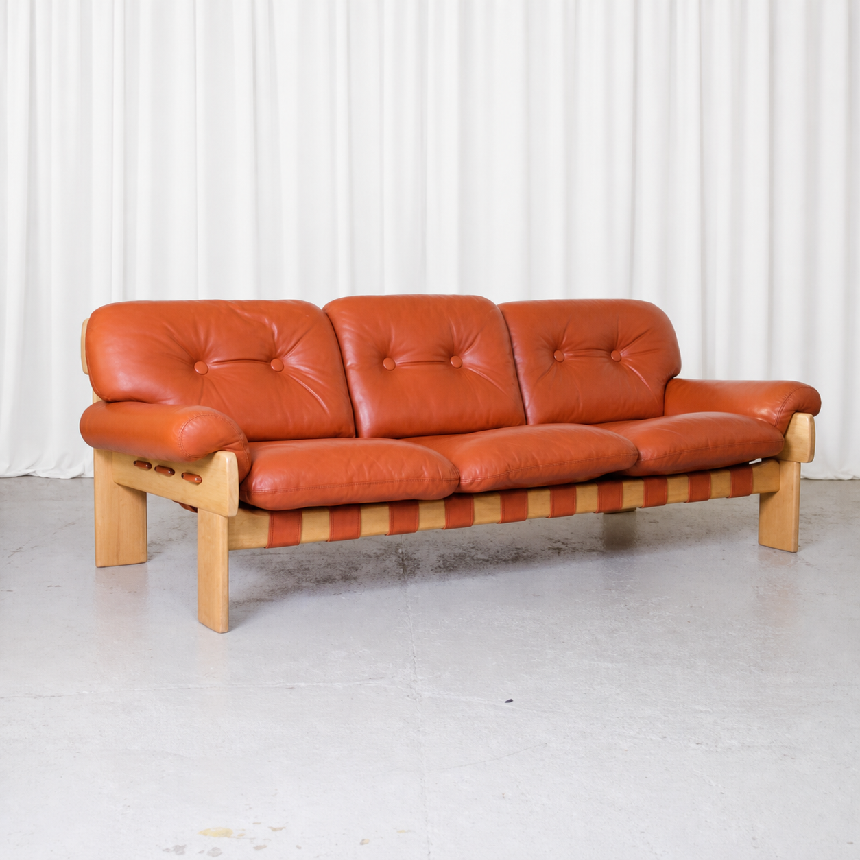 Esko Pajamies Africa three-seat sofa for Asko in cognac leather, front view