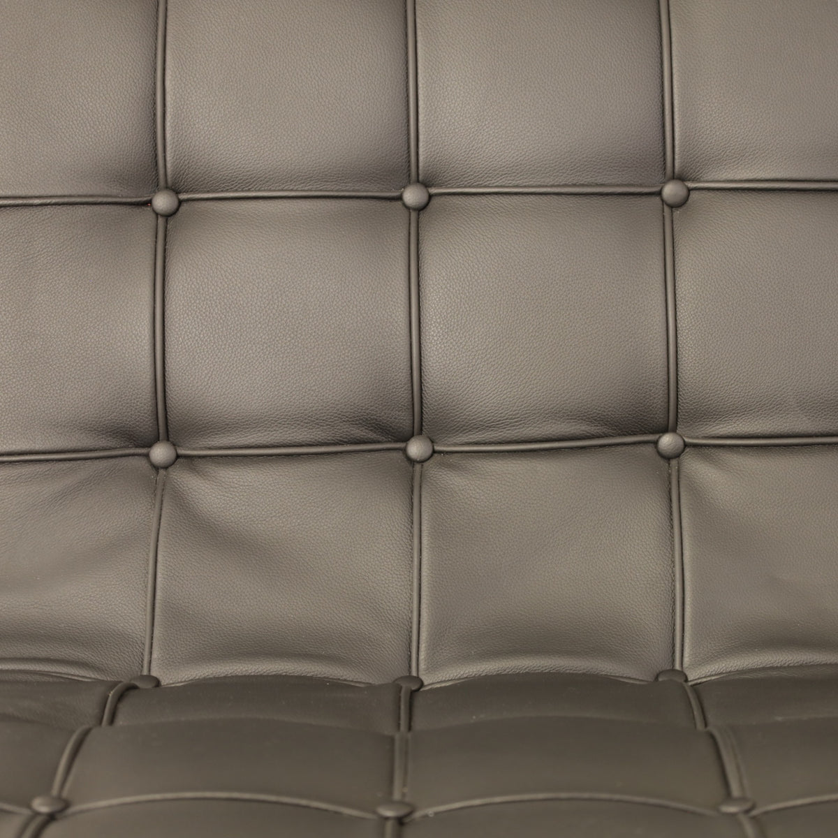ICF New York lounge chair in black leather, buttoned leather and frame detail