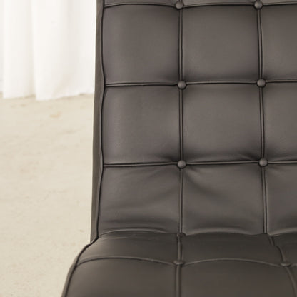 ICF New York lounge chair in black leather, buttoned leather and frame detail