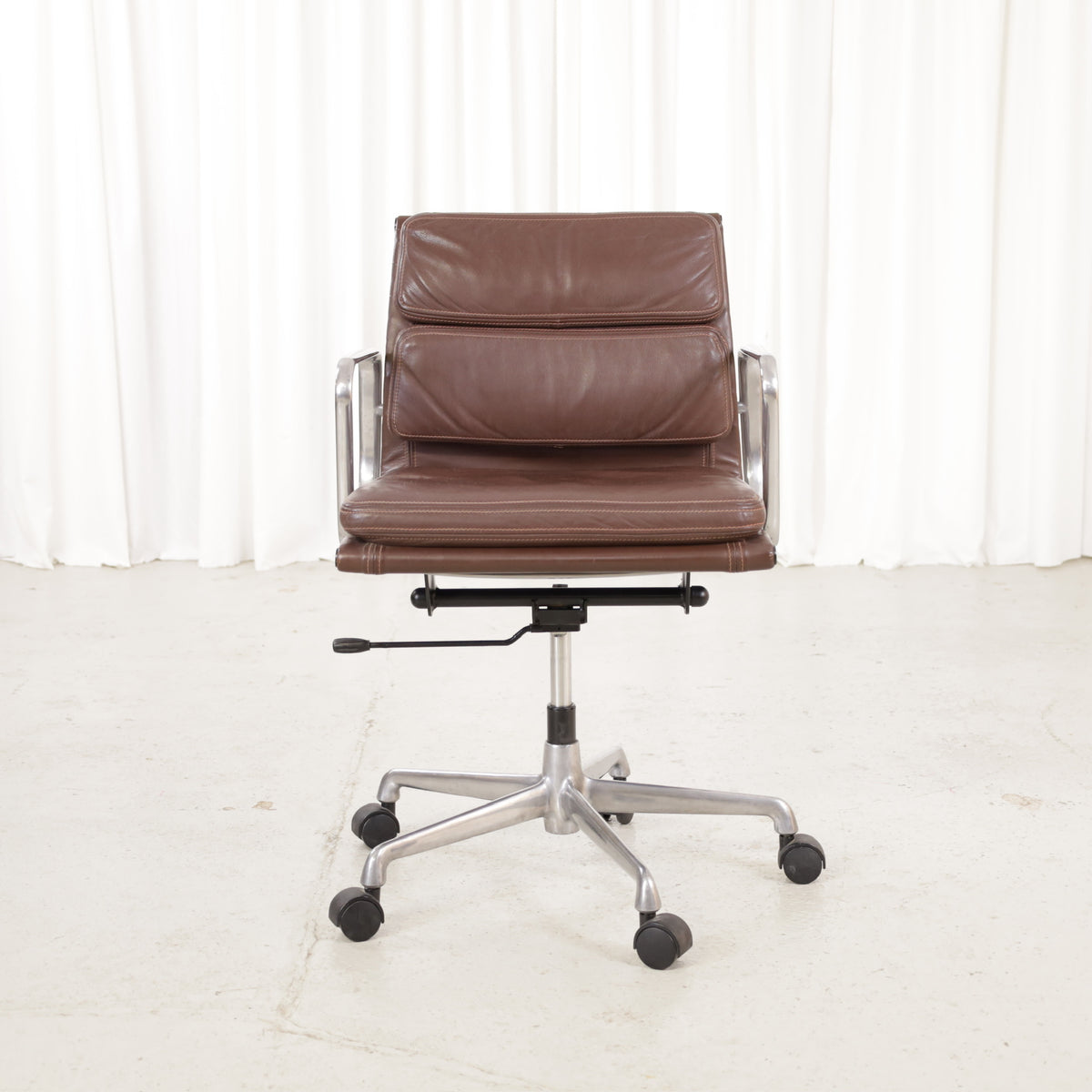 Front view of the brown leather Soft Pad chair