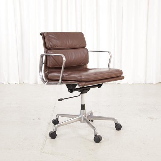 Front angled view of the brown leather Soft Pad chair