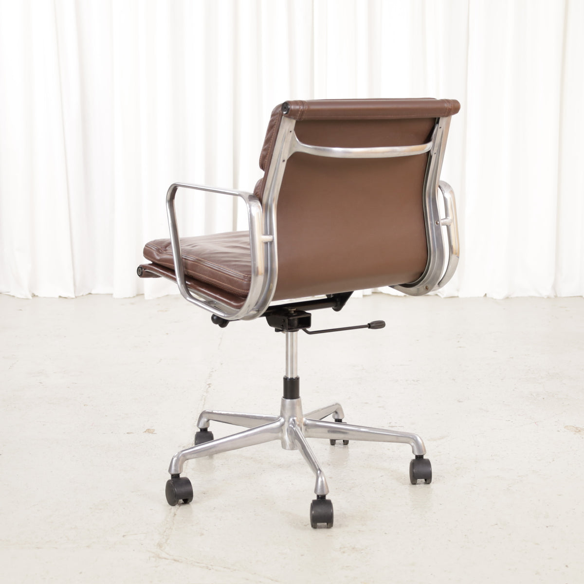 Rear angled view of the second brown leather Soft Pad chair