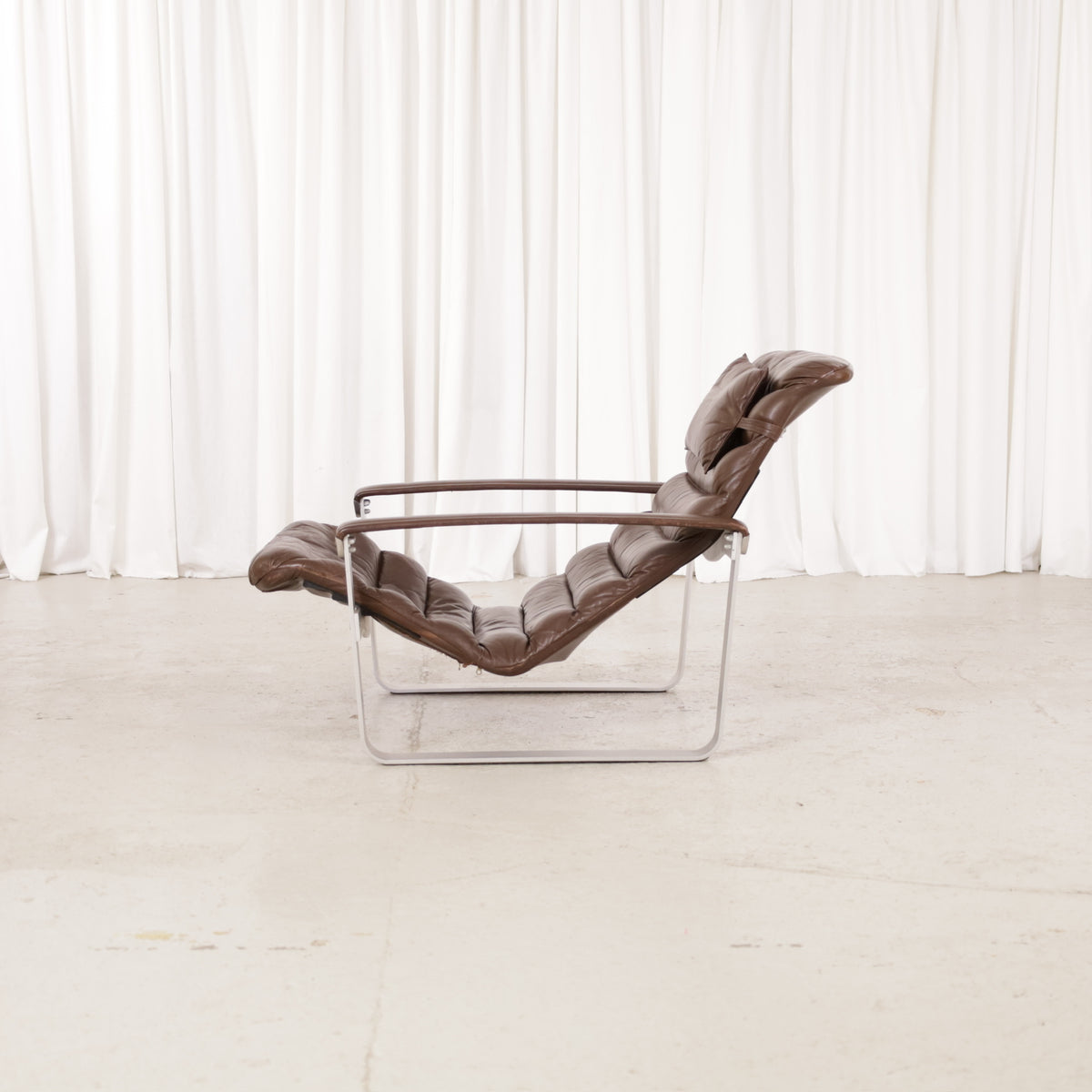 Ilmari Lappalainen Pulkka Lounge Chair in Brown Leather for Asko, ilmari Lappalainen Pulkka lounge chair in brown leather, side view