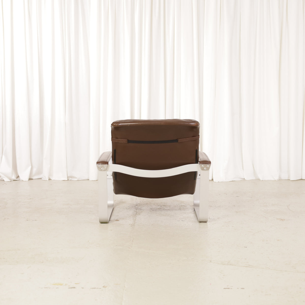 Ilmari Lappalainen Pulkka Lounge Chair in Brown Leather for Asko, ilmari Lappalainen Pulkka lounge chair, three-quarter side view