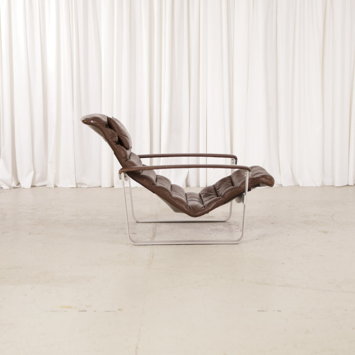 Ilmari Lappalainen Pulkka Lounge Chair in Brown Leather for Asko, ilmari Lappalainen Pulkka lounge chair in brown leather, front angle