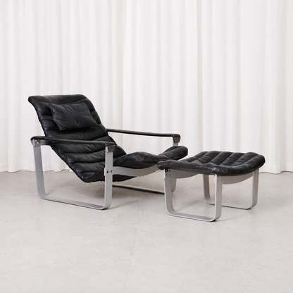 Ilmari Lappalainen Pulkka Lounge Chair and Ottoman in Black Leather, Asko Export