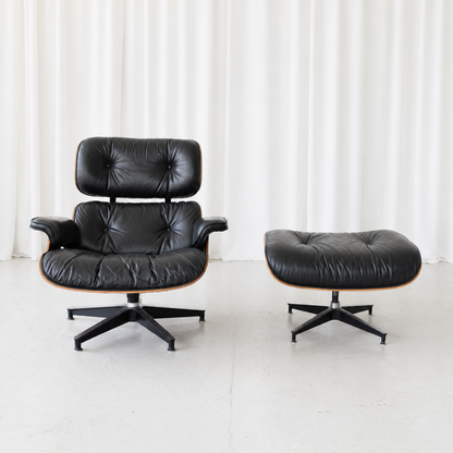 Eames Lounge Chair and Ottoman by Herman Miller in Rosewood and Black Leather