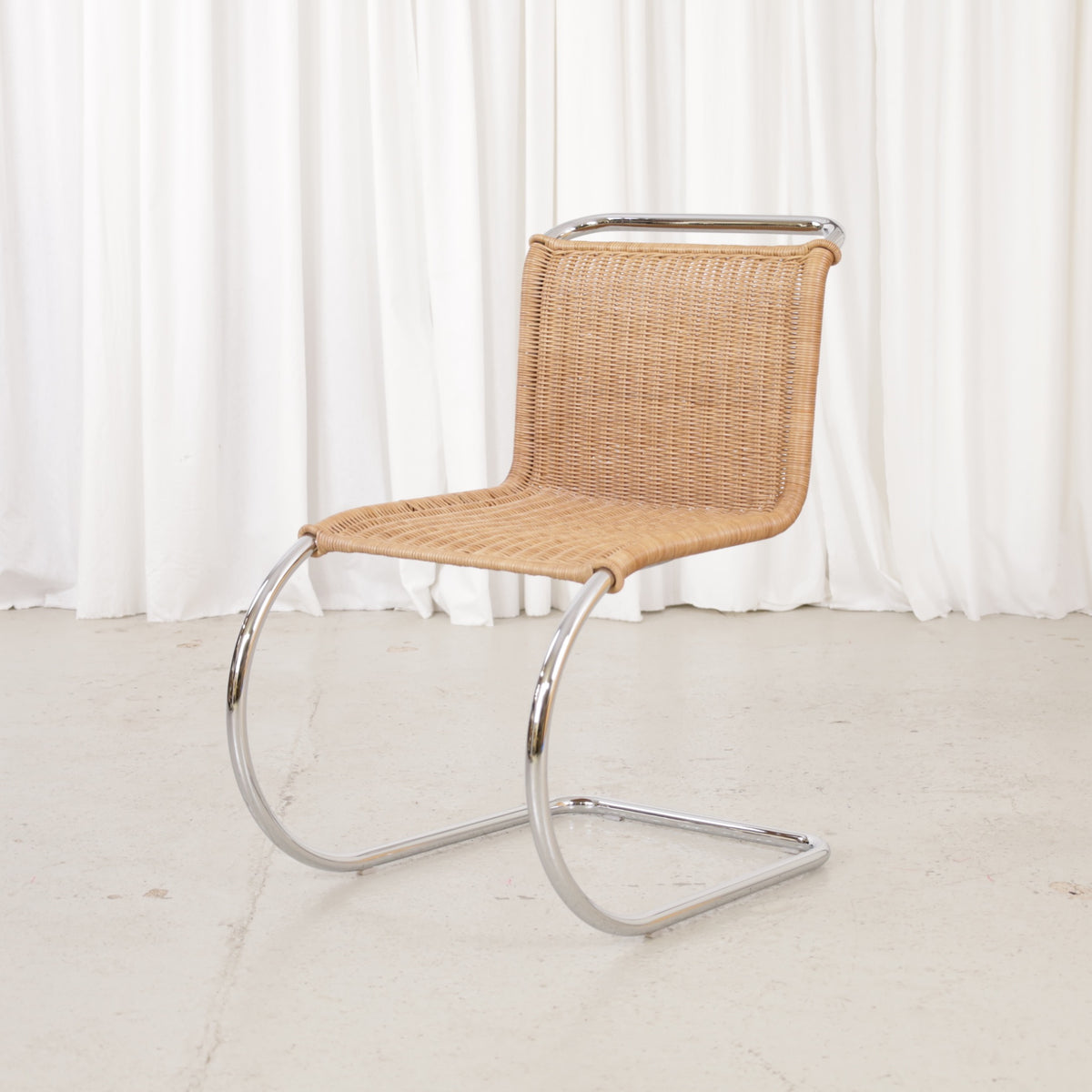 Knoll MR10 rattan chair by Ludwig Mies van der Rohe, chair view