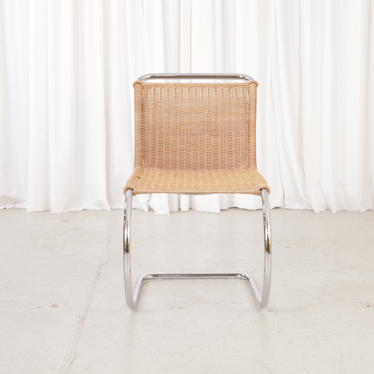 Knoll MR10 rattan chair by Ludwig Mies van der Rohe, chair view