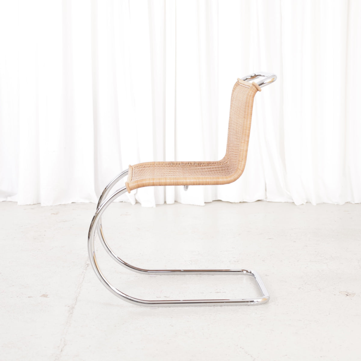 Knoll MR10 rattan chair by Ludwig Mies van der Rohe, chair view
