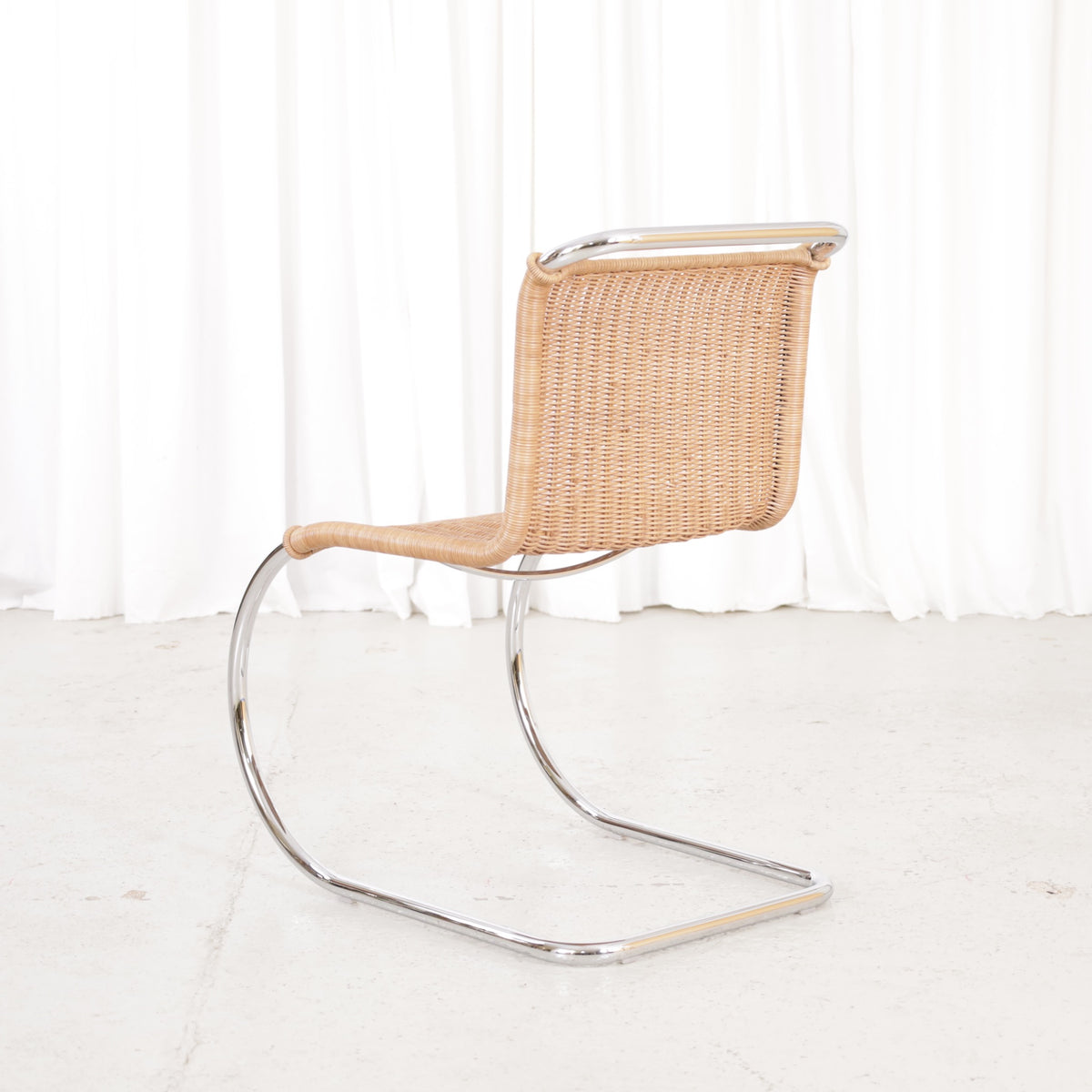 Knoll MR10 rattan chair by Ludwig Mies van der Rohe, chair view
