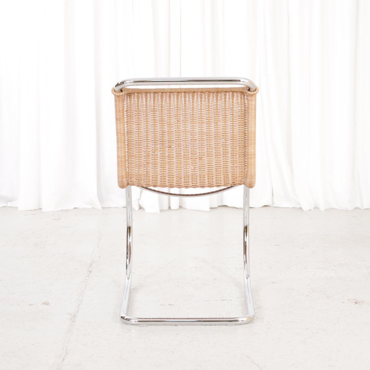 Knoll MR10 rattan chair by Ludwig Mies van der Rohe, chair view