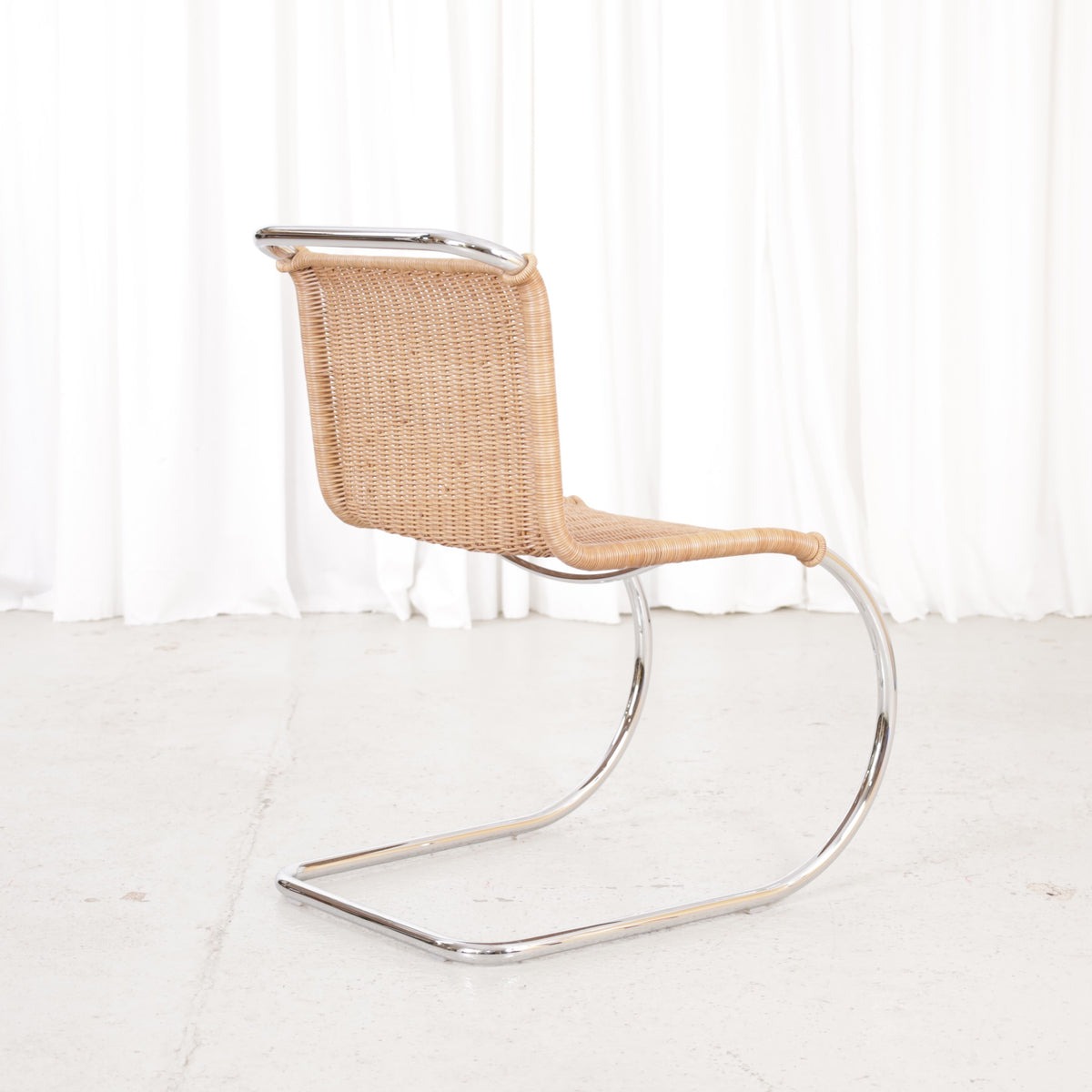 Knoll MR10 rattan chair by Ludwig Mies van der Rohe, chair view