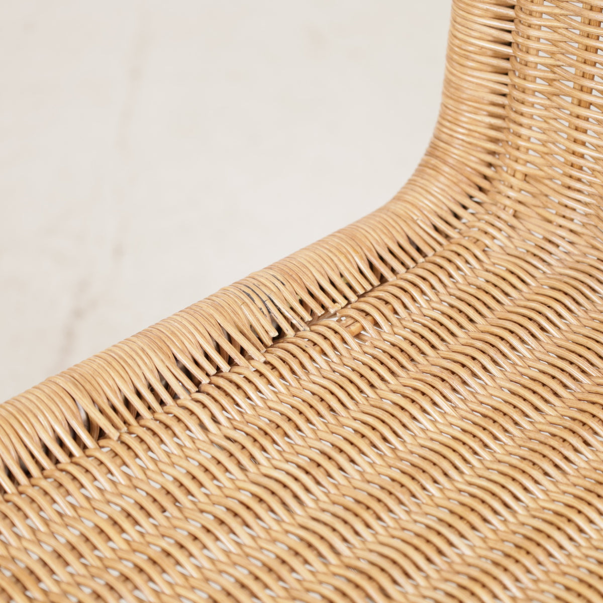 Knoll MR10 rattan chair by Ludwig Mies van der Rohe, detail of damaged cane along the side
