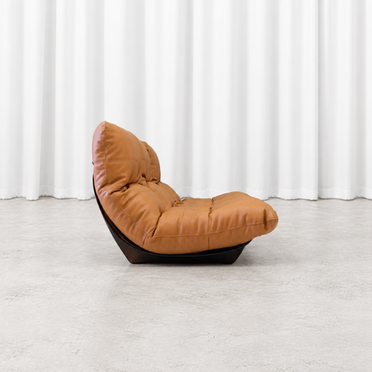 Ligne Roset Marsala three-seater sofa in cognac leather, side profile.