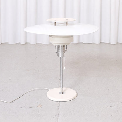 White and chrome Aurora table lamp by Olle Andersson for Boréns, front view