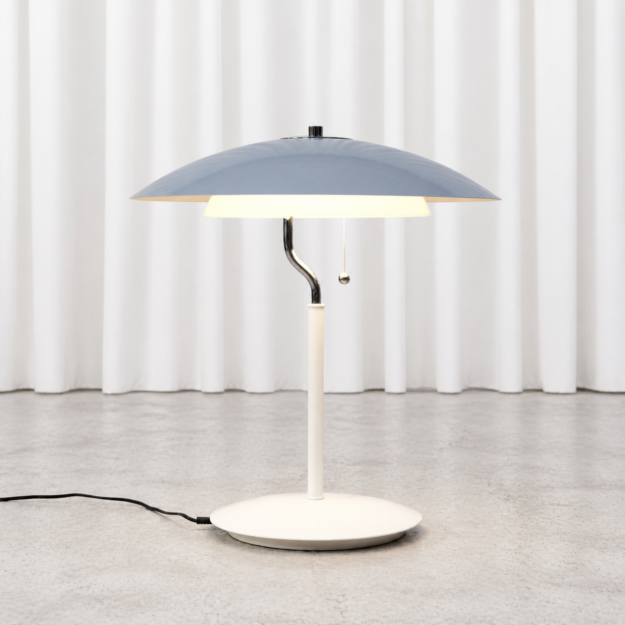 White Aurora table lamp by Olle Andersson for Boréns, illuminated front view