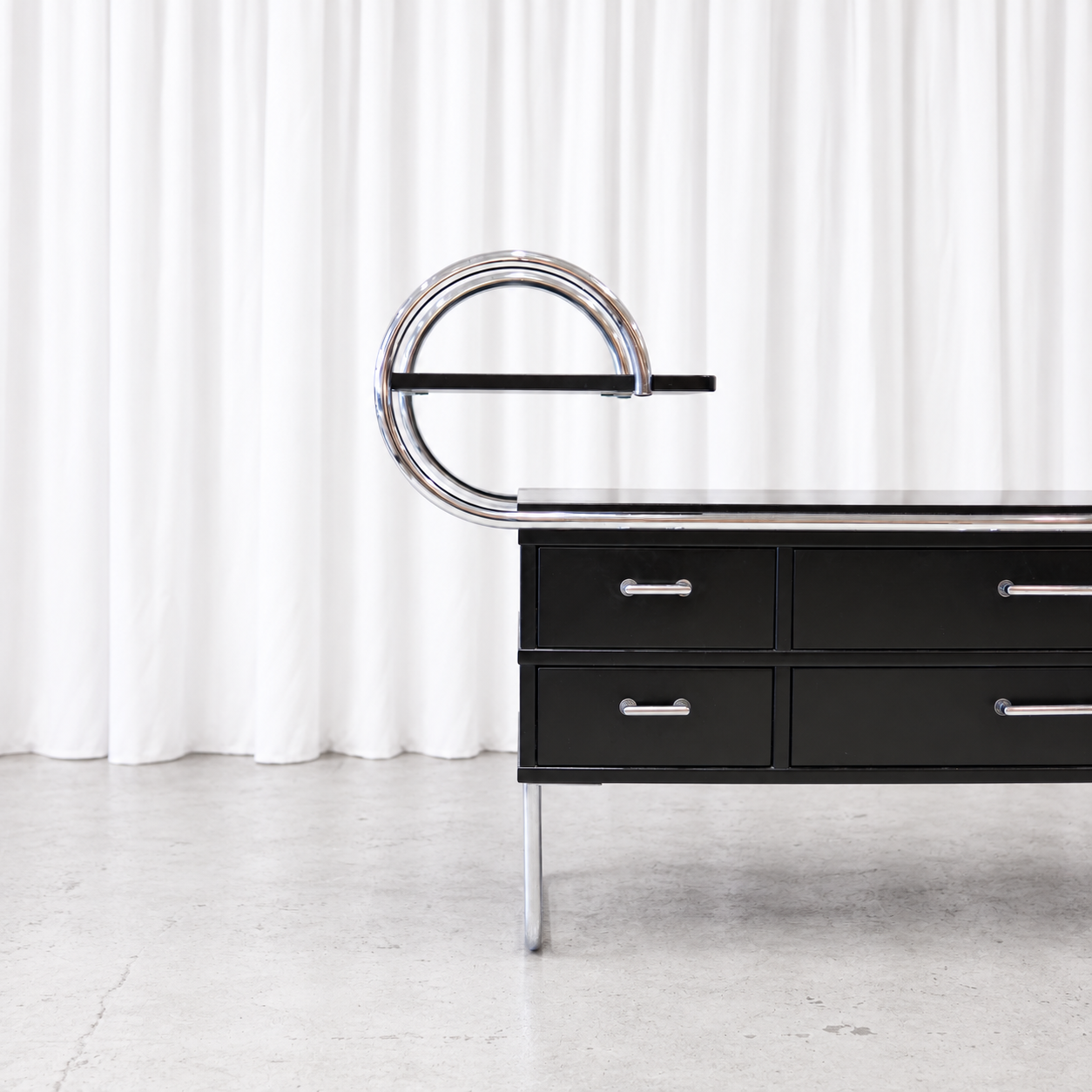 Post Deco 1300 credenza with curved chrome frame and drawers