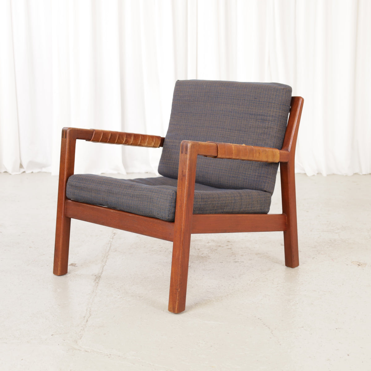 Rialto lounge chair by Carl-Gustaf Hiort af Ornäs, chair view with solid leather back panel