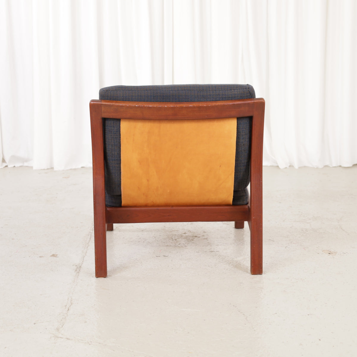 Rialto lounge chair by Carl-Gustaf Hiort af Ornäs, chair view with solid leather back panel