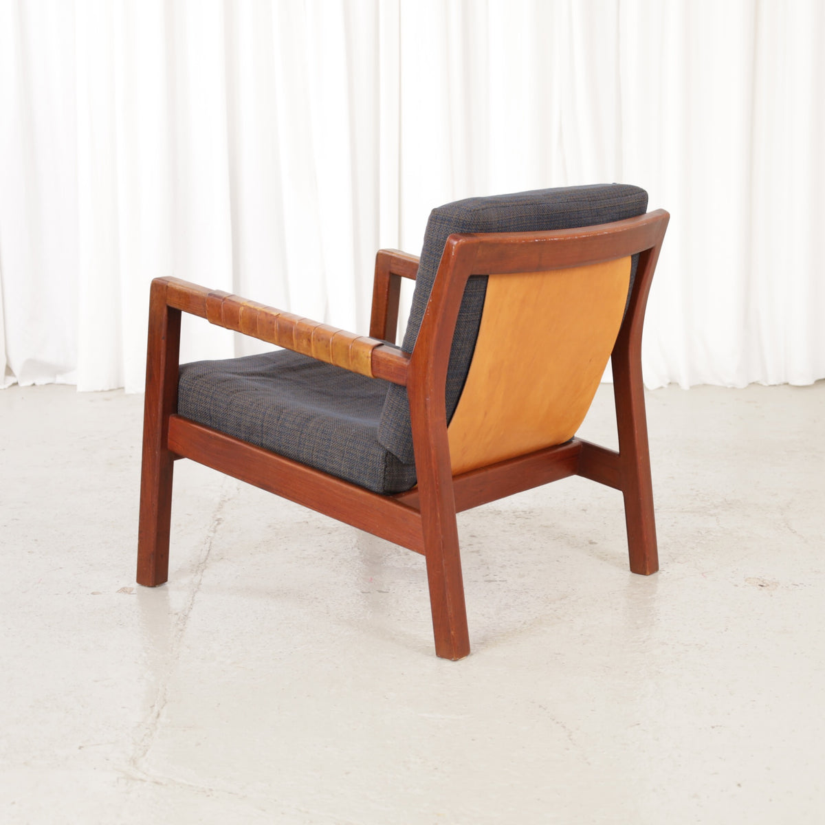 Rialto lounge chair by Carl-Gustaf Hiort af Ornäs, chair view with solid leather back panel