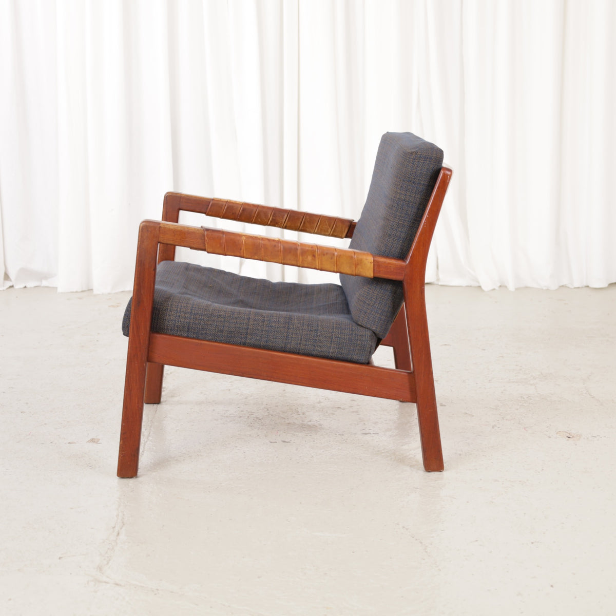 Rialto lounge chair by Carl-Gustaf Hiort af Ornäs, chair view with solid leather back panel