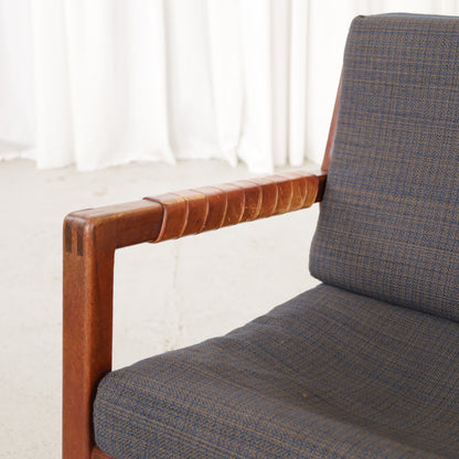 Rialto lounge chair by Carl-Gustaf Hiort af Ornäs, patinated leather, wooden frame and patterned fabric detail