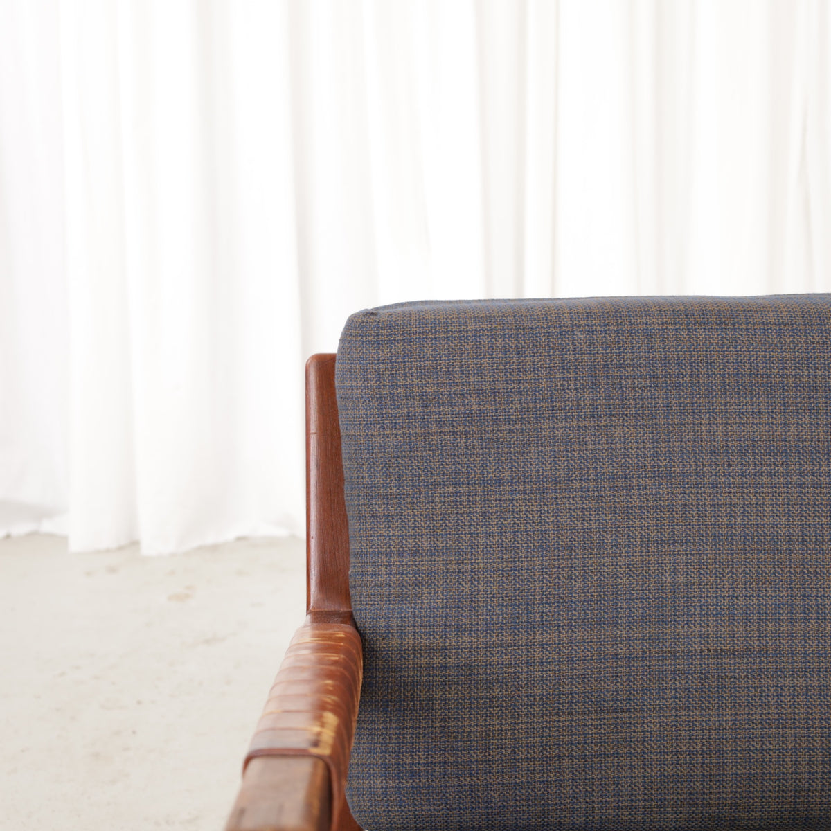 Rialto lounge chair by Carl-Gustaf Hiort af Ornäs, patinated leather, wooden frame and patterned fabric detail