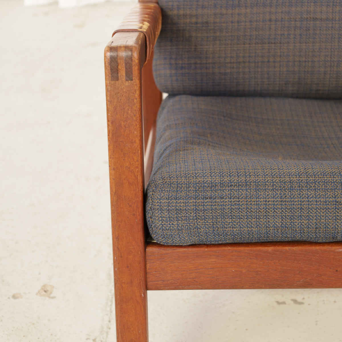 Rialto lounge chair by Carl-Gustaf Hiort af Ornäs, patinated leather, wooden frame and patterned fabric detail