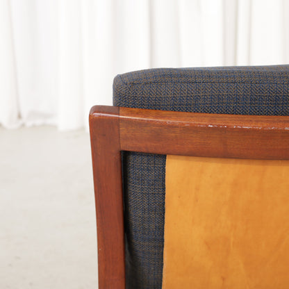 Rialto lounge chair by Carl-Gustaf Hiort af Ornäs, patinated leather, wooden frame and patterned fabric detail