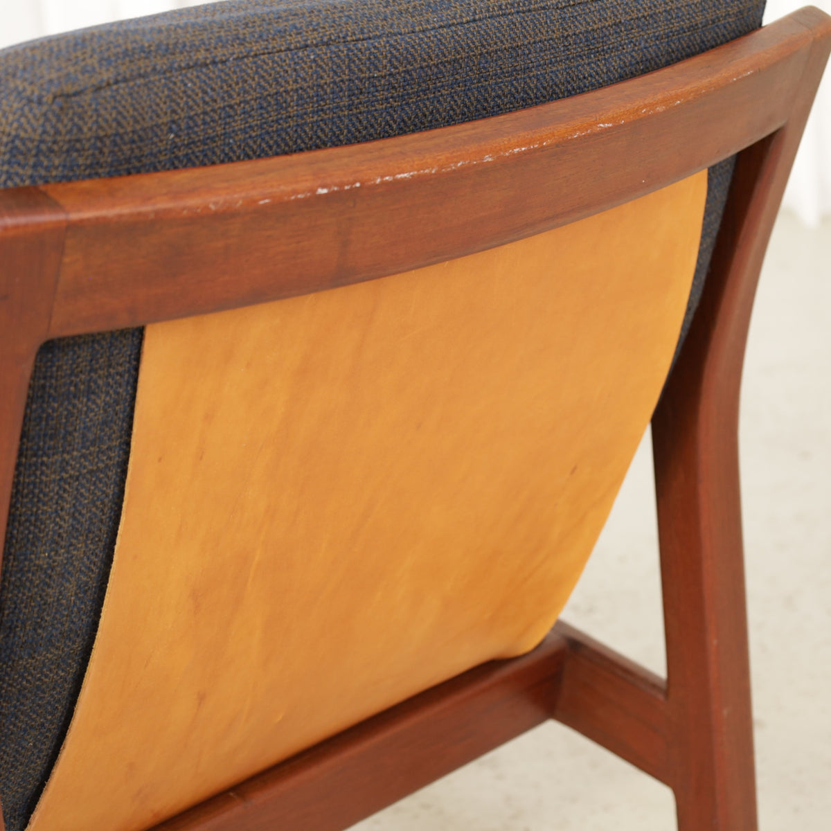 Rialto lounge chair by Carl-Gustaf Hiort af Ornäs, patinated leather, wooden frame and patterned fabric detail