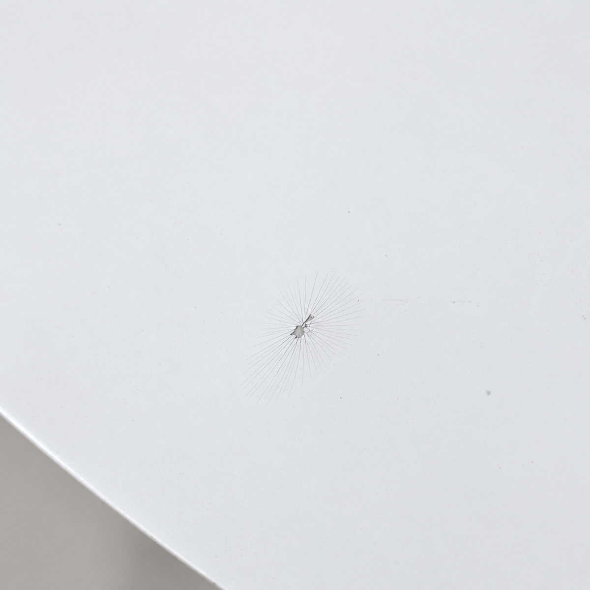 Small dent and surface mark on the white JL341 shade