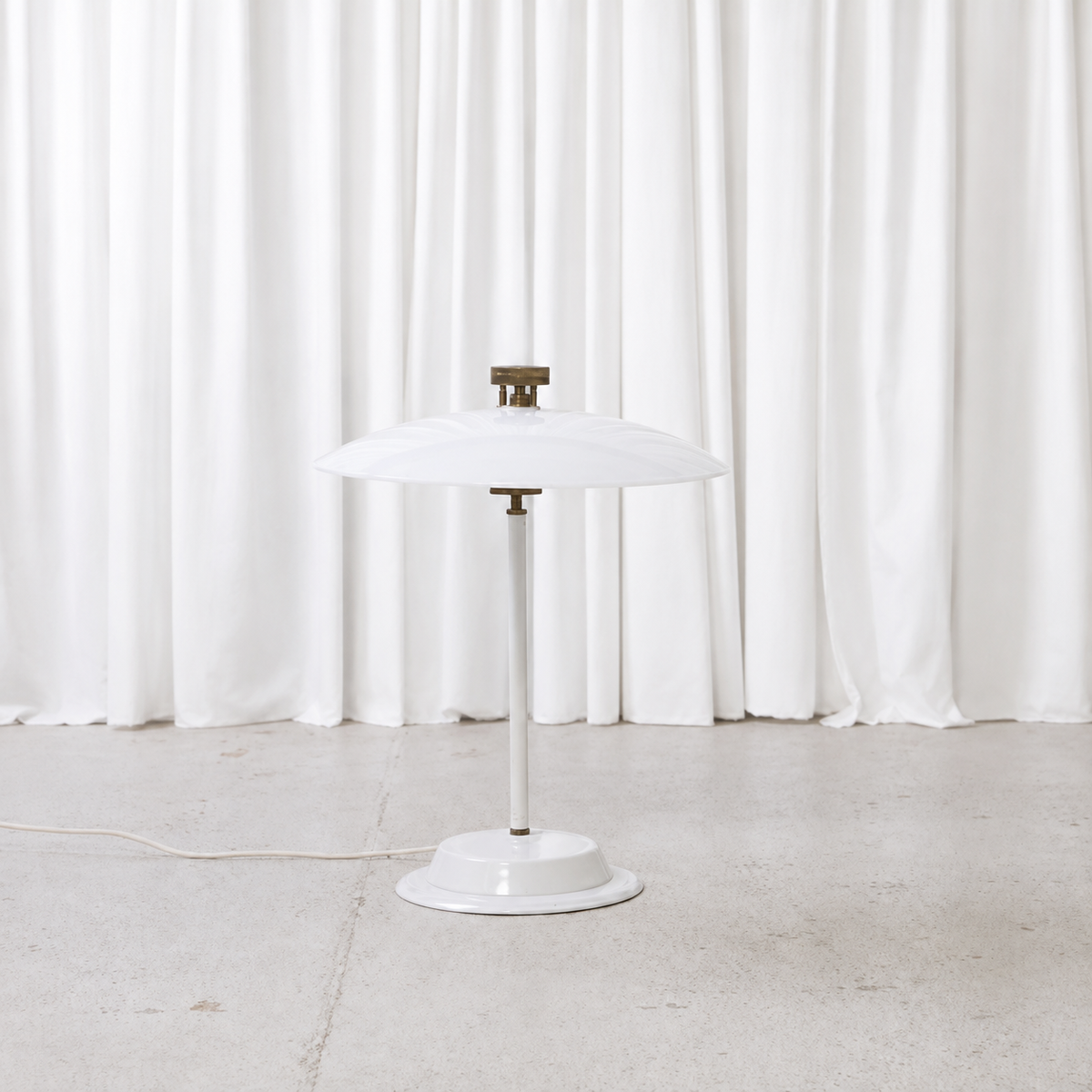 Front view of vintage table lamp with translucent acrylic shade