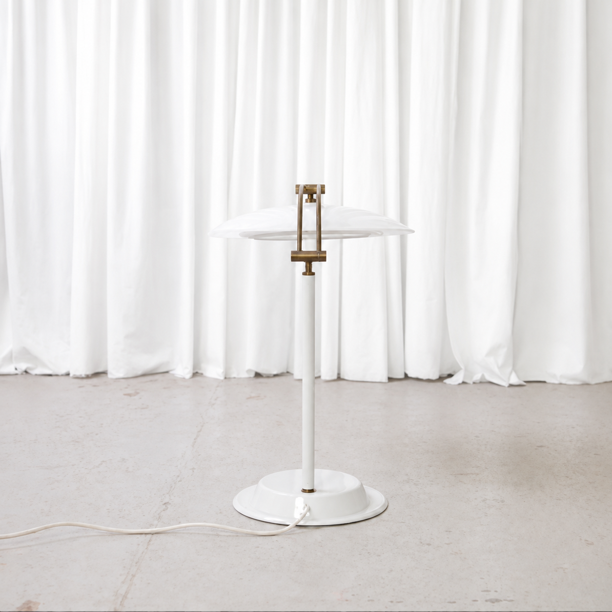 Rear view of vintage table lamp with white metal base
