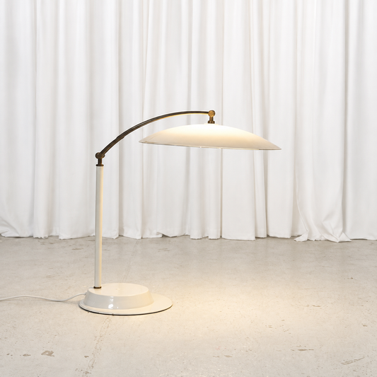Vintage adjustable table lamp with white acrylic shade and brass arm