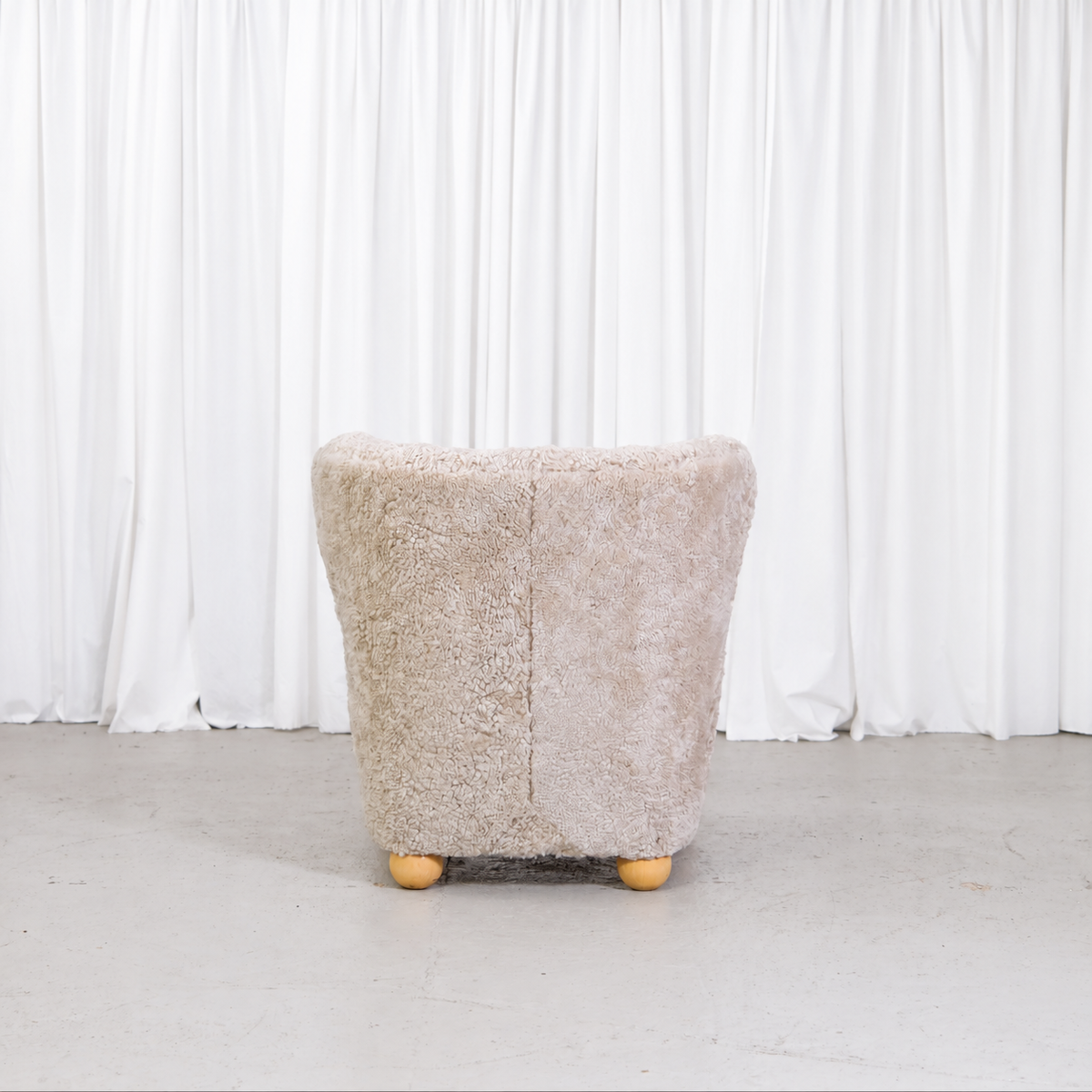 Vintage Danish sheepskin armchair, back view