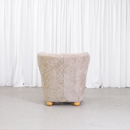 Vintage Danish sheepskin armchair, back view