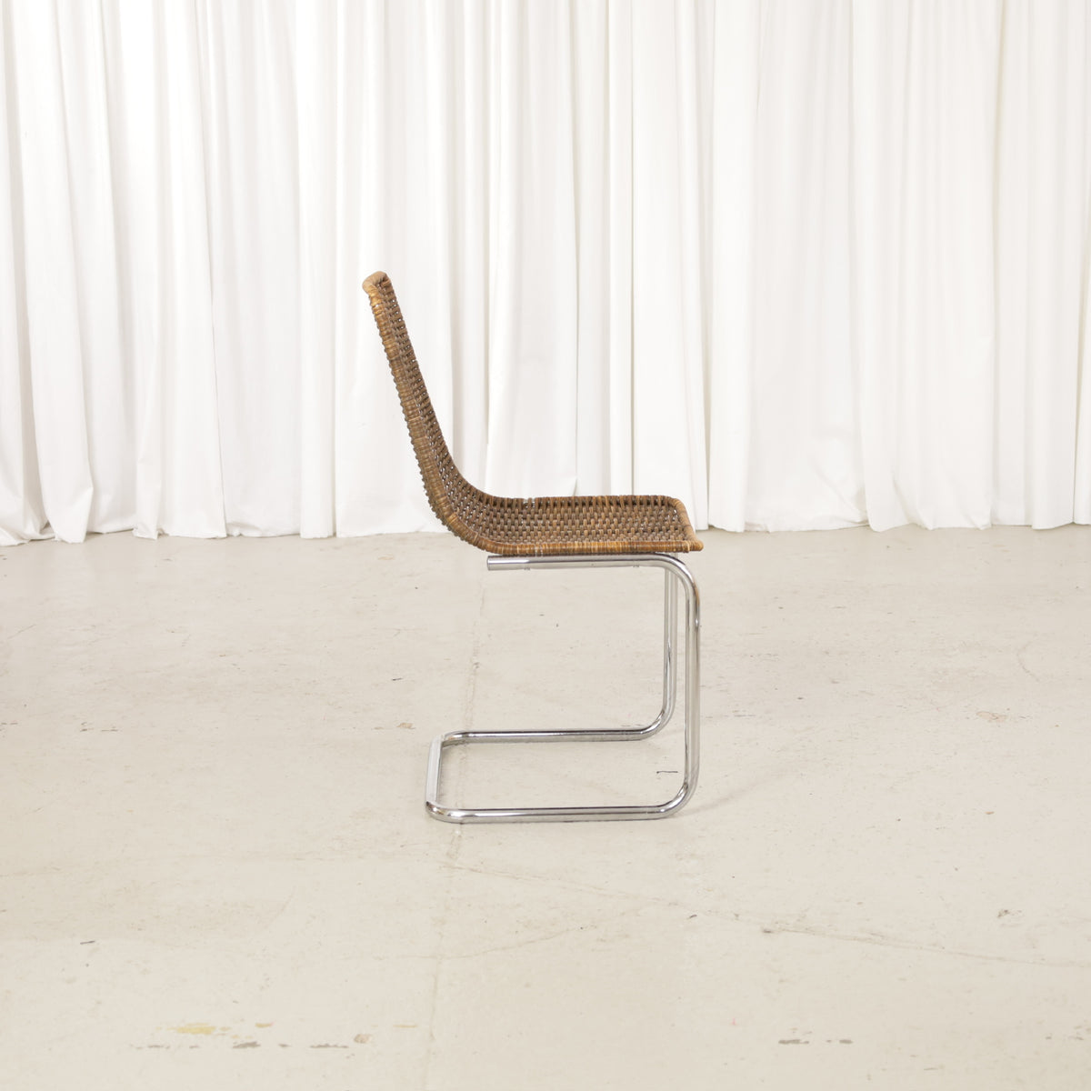 Vintage Italian Chrome and Rattan Cantilever Chair, vintage Italian chrome and rattan chair, side profile